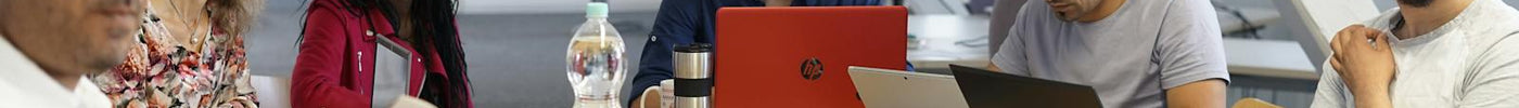 Buyer analyzing medical consumables cost structures on a laptop