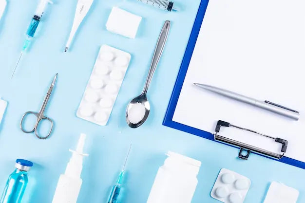 Surgical tools on green cloth